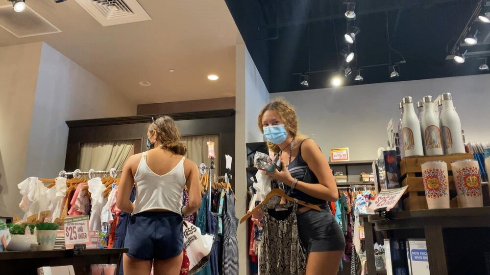 Brunette teen in shorts shopping (1).jpg