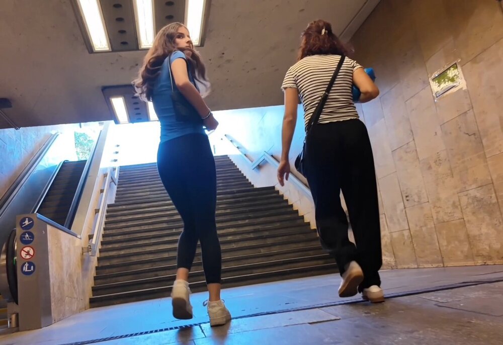 brunette teenie with a tight peach and vpl in black leggings out shopping with mom (3).jpg