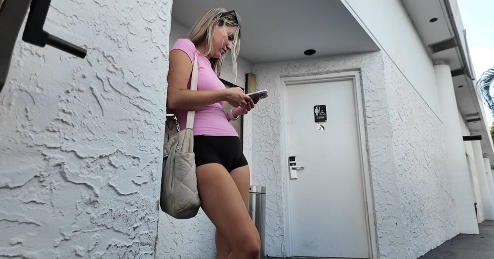 hot blonde college girl with a wide booty and sexy thigh gap in spandex shorts (7).jpg